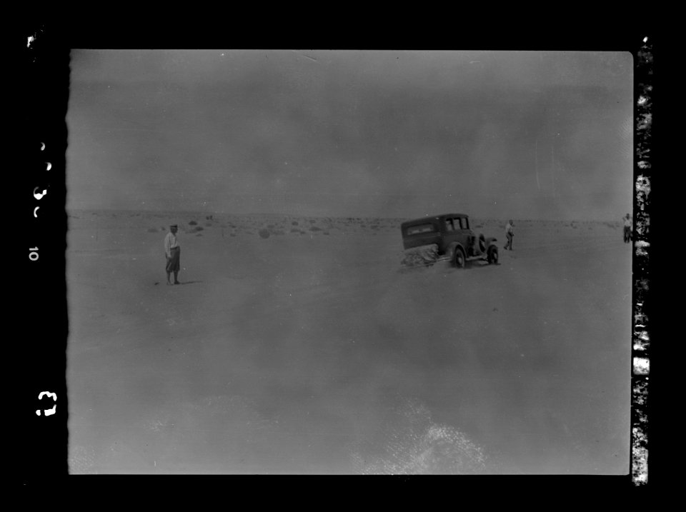 To Sinai by car. Car rushing a sand dune near Bir Hassana LOC matpc.15551