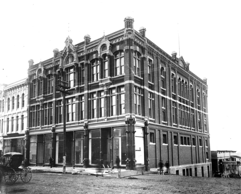 Toklas and Singerman Building, southwest corner of 1st Ave and Columbia St, ca 1888 (WARNER 634)