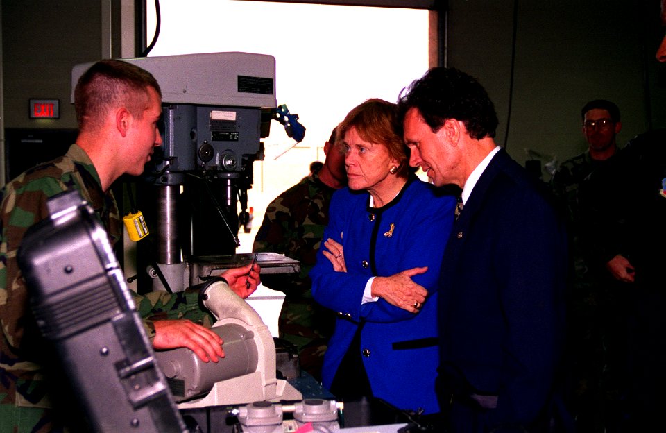 Tom Daschle and Sheila Widnall listen attentively to Ryan Page