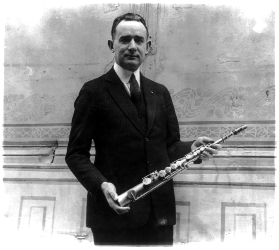 Tomm Brown, who claims to have had the first saxaphone act, posed with 1st saxaphone made by Adolph Sax, the inventor LCCN2002695685