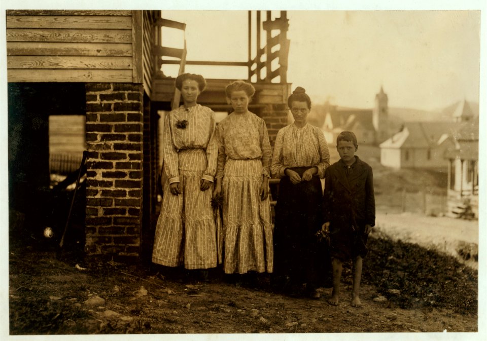 Tommy Bullard and his family. He has been sweeping for over a year in Washington Cotton Mills, Fries, Va. Said he was 13, but it is doubtful. Mother is a widow. Sisters in the mill too. LOC nclc.02137