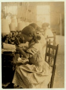 Topper at her machine, Walker County Hosiery Mills, Lafayette Ga. LOC nclc.02765