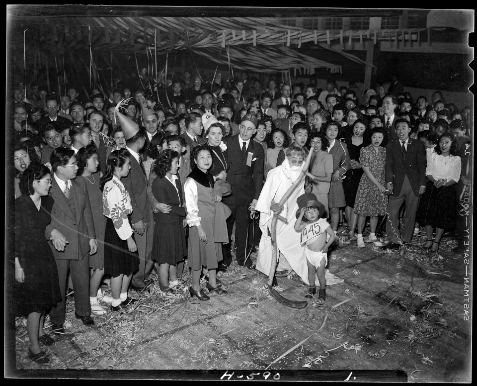 Topaz, Utah. Evacuees celebrate New Year's Eve. Japanese Americans at Central Utah Relocation Cent . . . - NARA - 539711