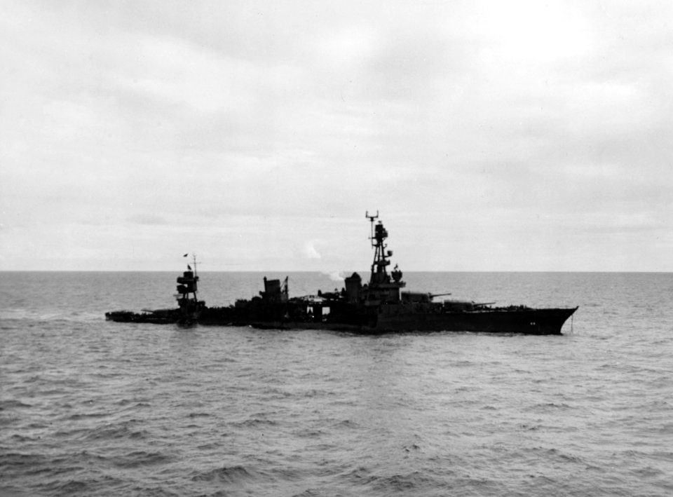 Torpedoed cruiser USS Chicago (CA-29) low in the water on 30 January 1943
