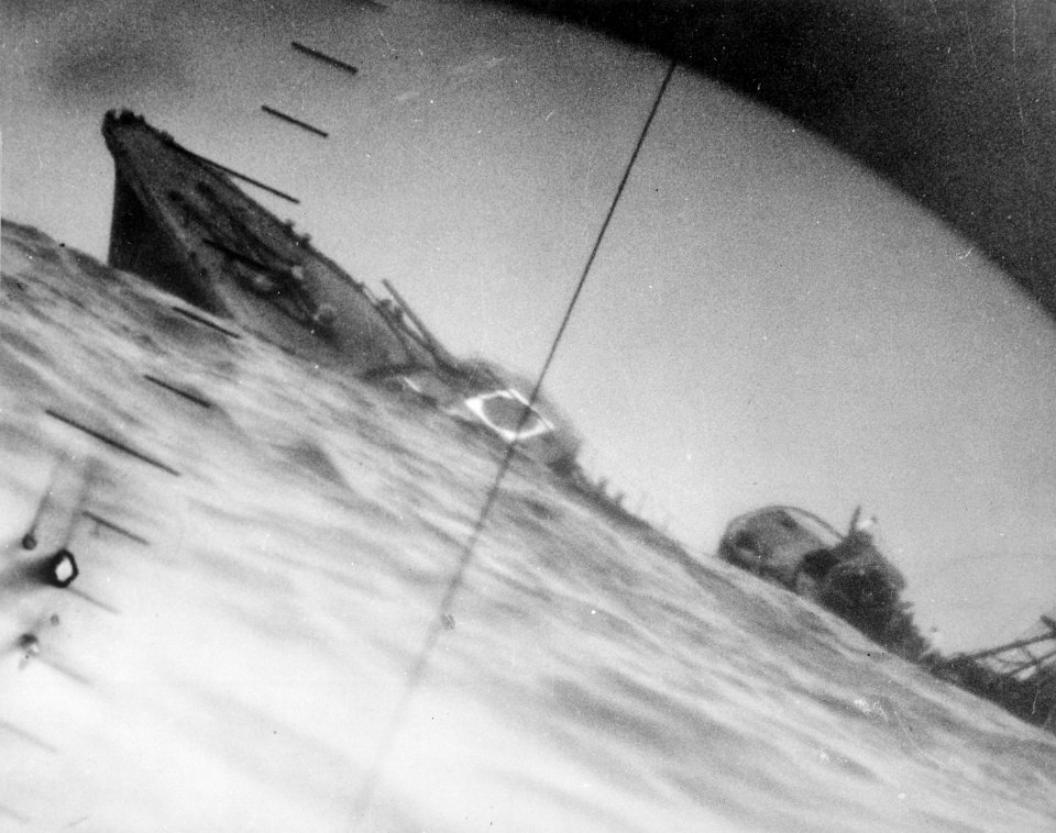 Torpedoed Japanese destroyer Yamakaze sinking on 25 June 1942