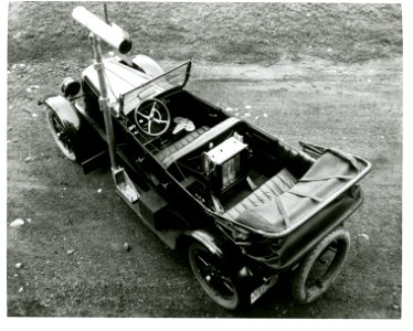 Tour car ready to measure and record 18 points of performance of its engine and operating equipment on the road photo