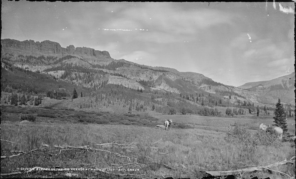 Trachytic bluffs, on the Rio Grande at the mouth of Lost Trail Creek. San Cristobal Quadrangle. Hinsdale County... - NARA - 517079