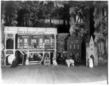 Trained dogs and monkeys running a dog and monkey hotel LCCN2002699156