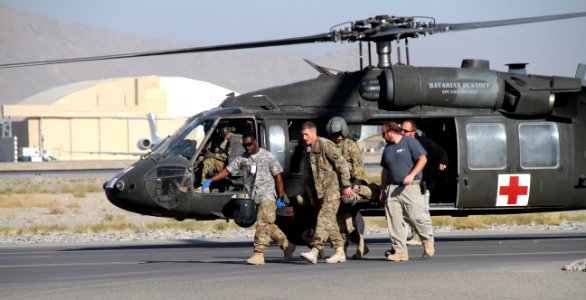 Training for medical evacuation and transport at Kandahar Airfield 141120-N-JY715-900