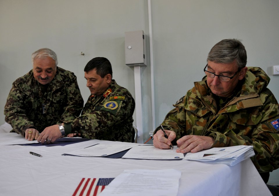 Transition ceremony marks coalition control to Afghans 131228-N-VZ328-161