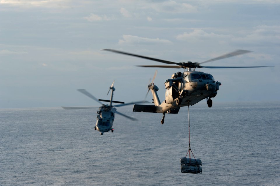 Transferring ammunition 130121-N-KG407-152