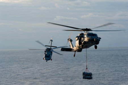 Transferring ammunition 130121-N-KG407-152