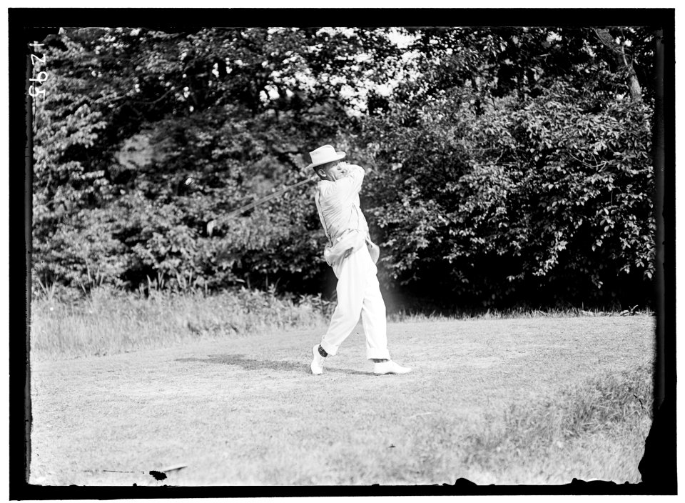 TRAVIS, WALTER. PLAYING GOLF LOC hec.01064