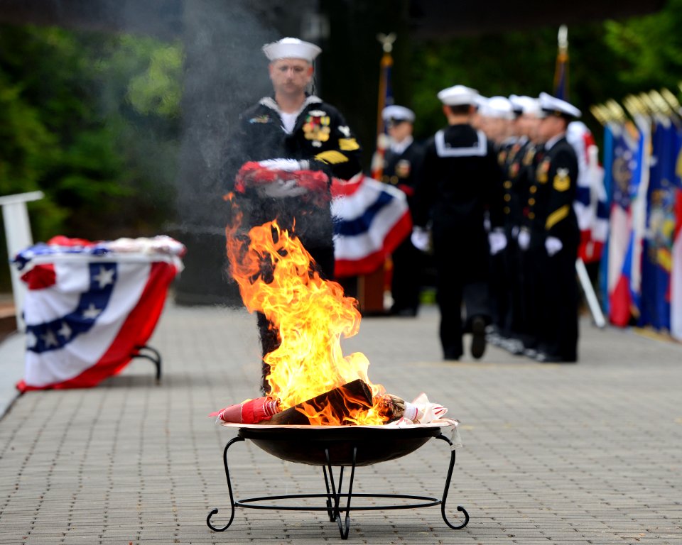 Trident Training Facility Bangor ceremoniously retires US flags 150612-N-VZ328-044