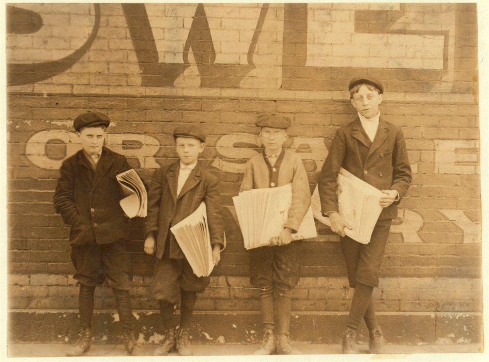 Truants like these may be found most any day between 11 & 12 A.M. Jefferson St. near Washington. May 5, 1910. LOC nclc.03463