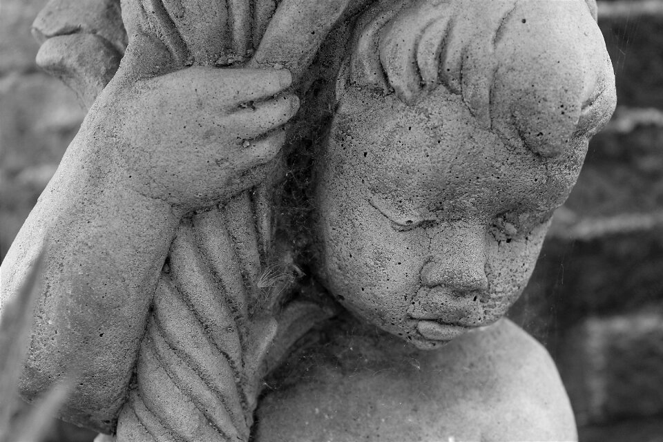 Thinking boy sad boy stone