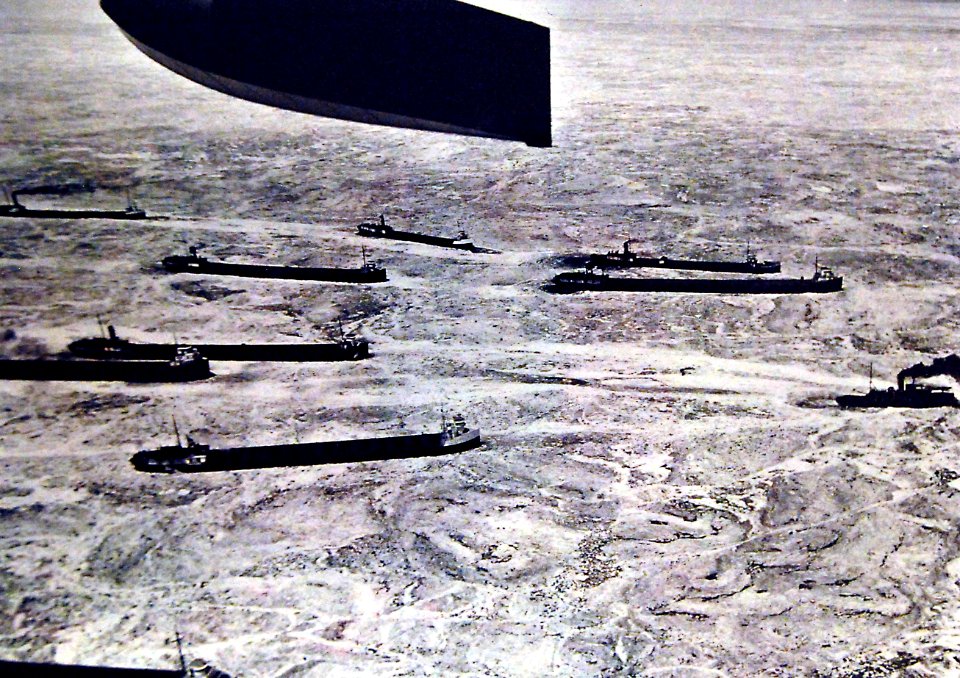 Tub boat leading freighters out of the ice of Buffalo, New York, WWII (27164412270)