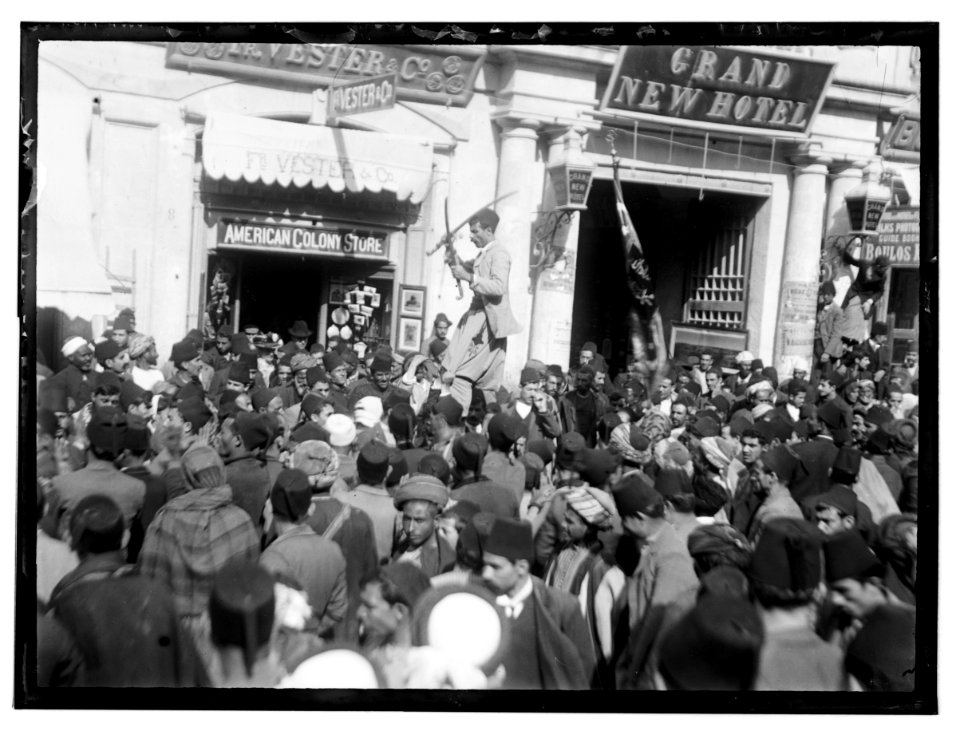 Turkish military WWI. Man dancing with swords at American Colony Store LOC matpc.07444