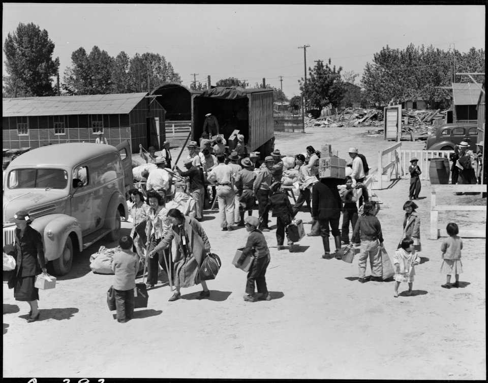 Turlock, California. Families of Japanese ancestry at the Turlock Assembly center. Their baggage w . . . - NARA - 537639