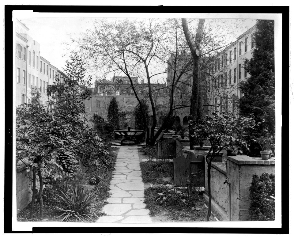 Turtle Bay Gardens, 227-247 East 48th Street and 228-46 East 49th Street, New York, New York. Looking west to common garden fountain LCCN2008678815