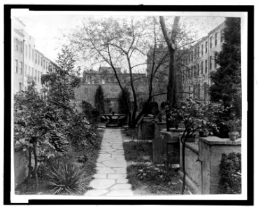 Turtle Bay Gardens, 227-247 East 48th Street and 228-46 East 49th Street, New York, New York. Looking west to common garden fountain LCCN2008678815