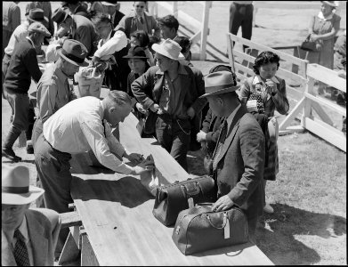 Turlock, California. Heads of families of Japanese ancestry are gathered about the table where thei . . . - NARA - 537641