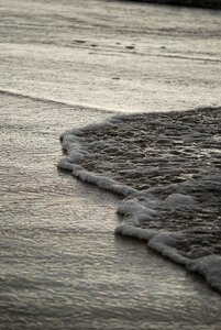 Beach sand surf photo