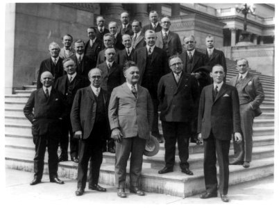 Twenty-three members of the U.S. House of Representatives who are members of Rotary Clubs posed on steps of the U.S. Capitol after having their rotary luncheon LCCN91786735