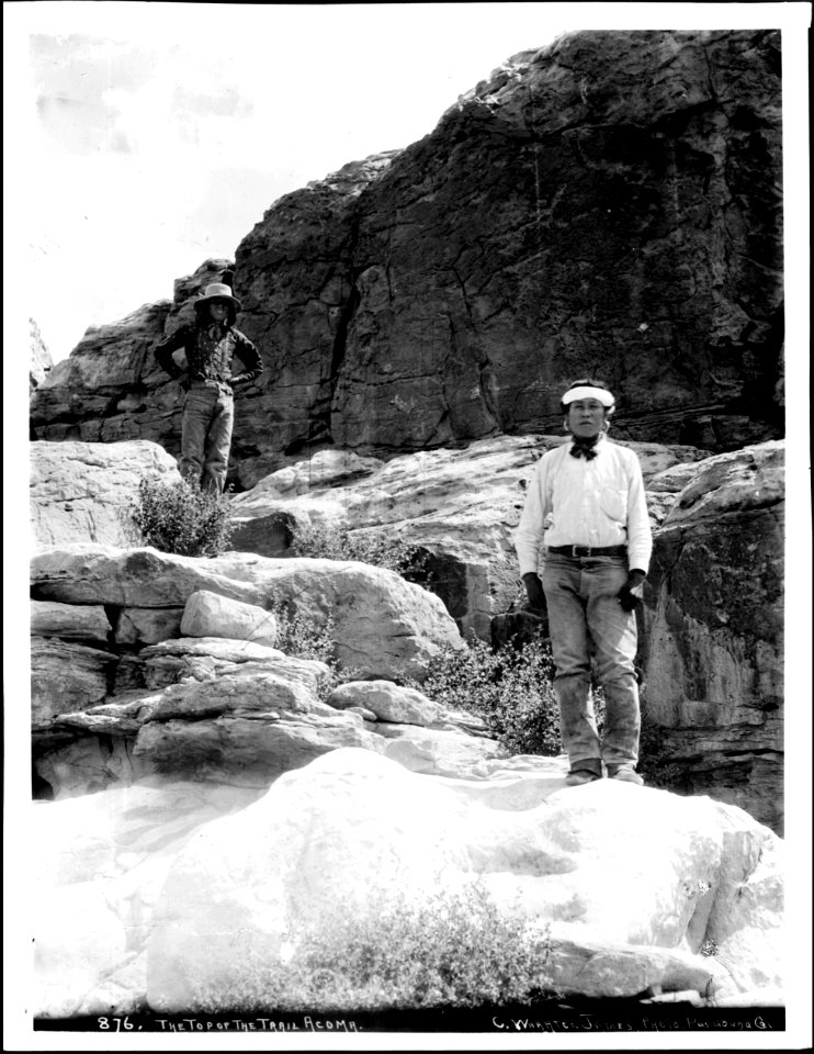 Two Acoma Indian men stand at the top of the Acoma Trail, 1886 (CHS-4525)