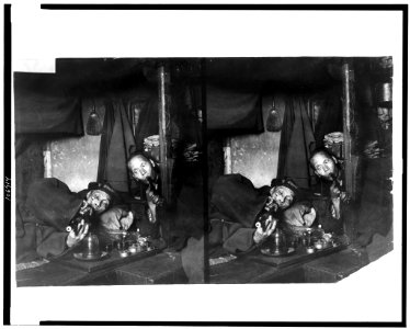 Two Chinese men, on narcotics in opium den LCCN92522317