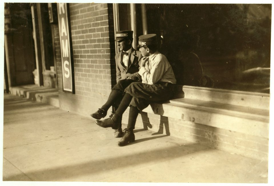 Two Beaumont messengers, 14 and 17 years old. The latter has been messenger here for 2 years. Works until midnight. The Red Light District flourished here. LOC nclc.03913