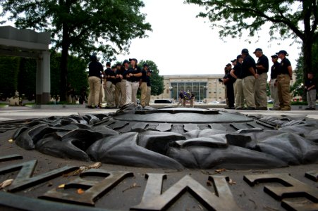 Two groups of law enforcement explorers at the National Law Enforcement Officers Memorial photo