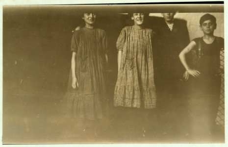 Two girls and boy beginning work in Amoskeag Mfg. Co., Manchester, N. H. 1-00 P.M., May 21, 1909. Photo taken in outer hall of spinning room where I saw them working. Left hand is Diana LOC nclc.01737