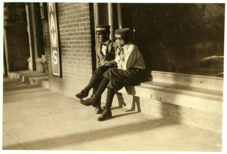Two Beaumont messengers, 14 and 17 years old. The latter has been messenger here for 2 years. Works until midnight. The Red Light District flourished here. LOC nclc.03913 photo