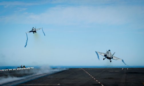 Two F-A-18Cs take off from USS Carl Vinson. (8497231797)
