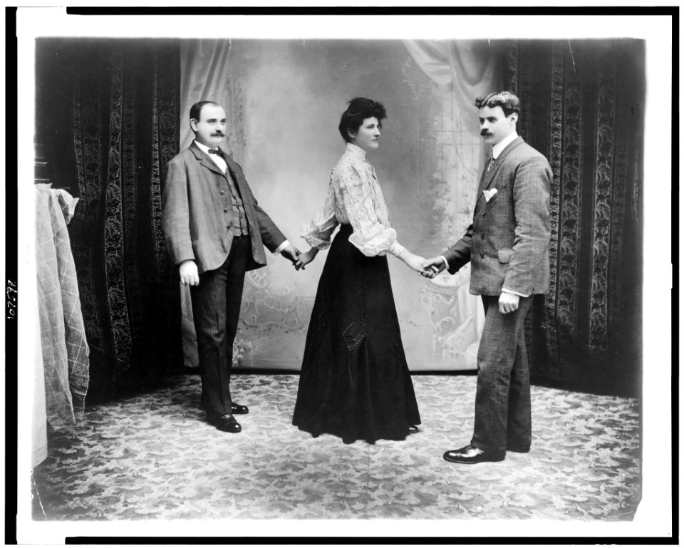 Two men and a woman dancing three hand reel) - D.A. Sigerist, fotographers, N.Y.C LCCN93503997