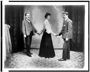Two men and a woman dancing three hand reel) - D.A. Sigerist, fotographers, N.Y.C LCCN93503997