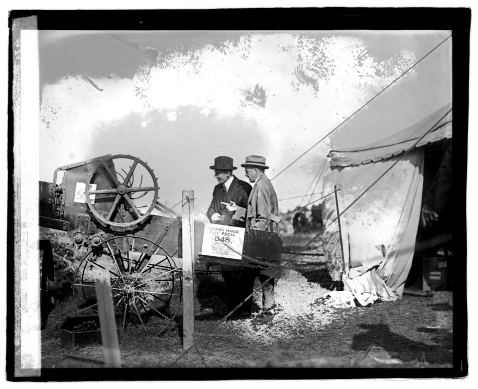 Two men with hay press LOC npcc.07229