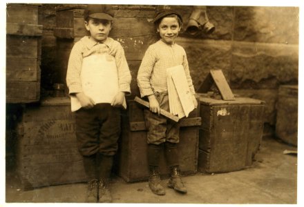 Two of the very youngest newsboys I could find in New Orleans. Seven and nine years old. Such little fellows are rare. LOC nclc.03923