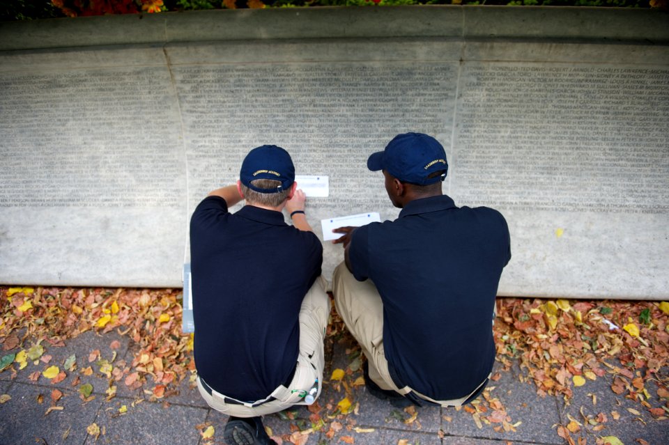 Two law enforcement explorers sitting at the National Law Enforcement Officers Memorial 2