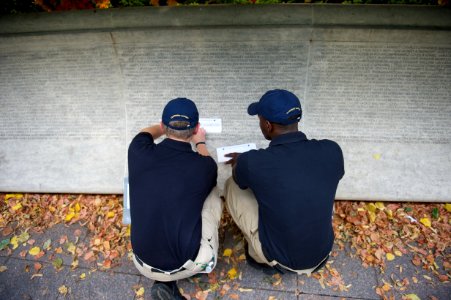 Two law enforcement explorers sitting at the National Law Enforcement Officers Memorial 2