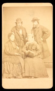 Two men and two women posing in formal attire) - J. G. Stacy, Rahway, N.J LCCN2016653167