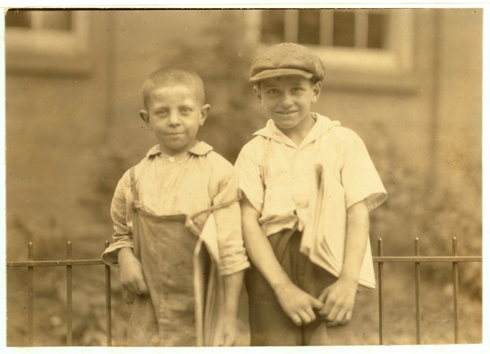 Two of the youngest newsboys in Hartford, Connecticut. They are cousins eight and ten years old. August 25, 1924. LOC nclc.04059