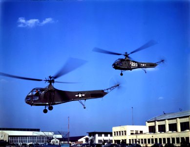 Two Sikorsky YR-4B helicopters in flight, circa in 1944 (80-G-K-15973)