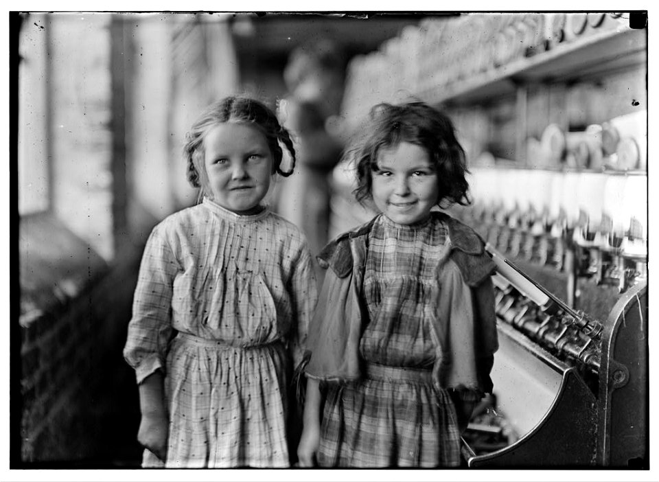 Two of the 'helpers' in the Tifton Cotton Mill, Tifton, Ga. They work regularly. LOC nclc.05398