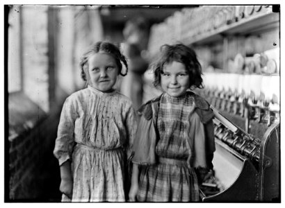 Two of the 'helpers' in the Tifton Cotton Mill, Tifton, Ga. They work regularly. LOC nclc.05398