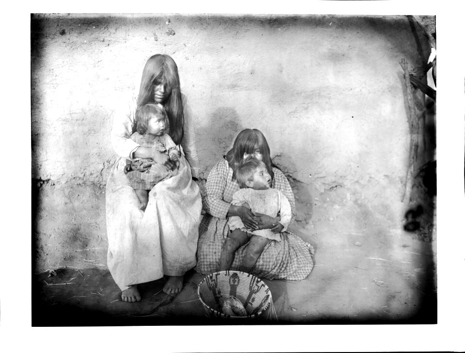 Two Pima Indian mothers, Nellie Law and Lulu Gage, each holding a baby, 1904 (CHS-3605)