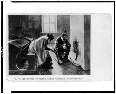 Two teachers huddled in front of fireplace in schoolroom in Russia LCCN90713110