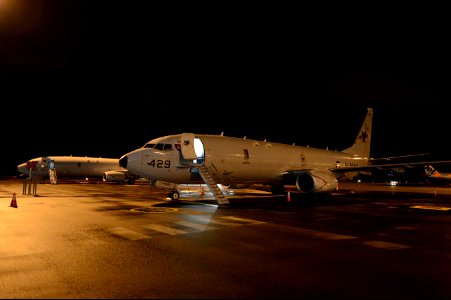 Two U.S. Navy P-8A Poseidon aircraft attached to Patrol Squadron (VP) 16 are prepared for search and recovery operations for Malaysia Airlines Flight 370 in Perth, Australia, April 1, 2014 140401-N-VD564-005