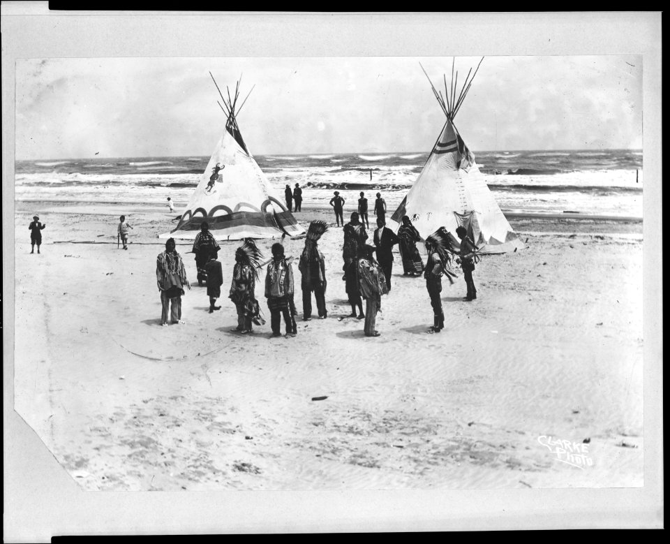 Two tipis on beach with Native Americans in foreground) - Clarke photo LCCN95507115
